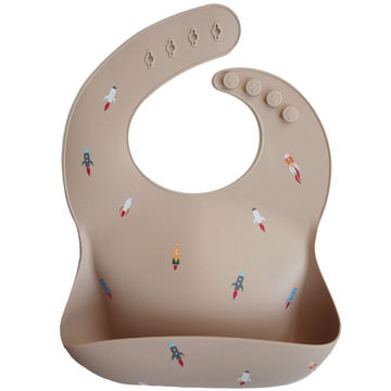Rocket Silicone Bib-Bib-Mushie-Babe Bump & Beyond. Shop on trend gender neutral clothing, with modern eco concious sustainable ethics. Featuring carefully curated brands for maternity, breastfeeding, baby, kids and mothers with fast shipping to New Zealand, australia and international. Pay by Afterpay or laybuy. free shipping.